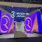 Riyadh Air stand at World Travel Market 2025 with branded hospitality setup.